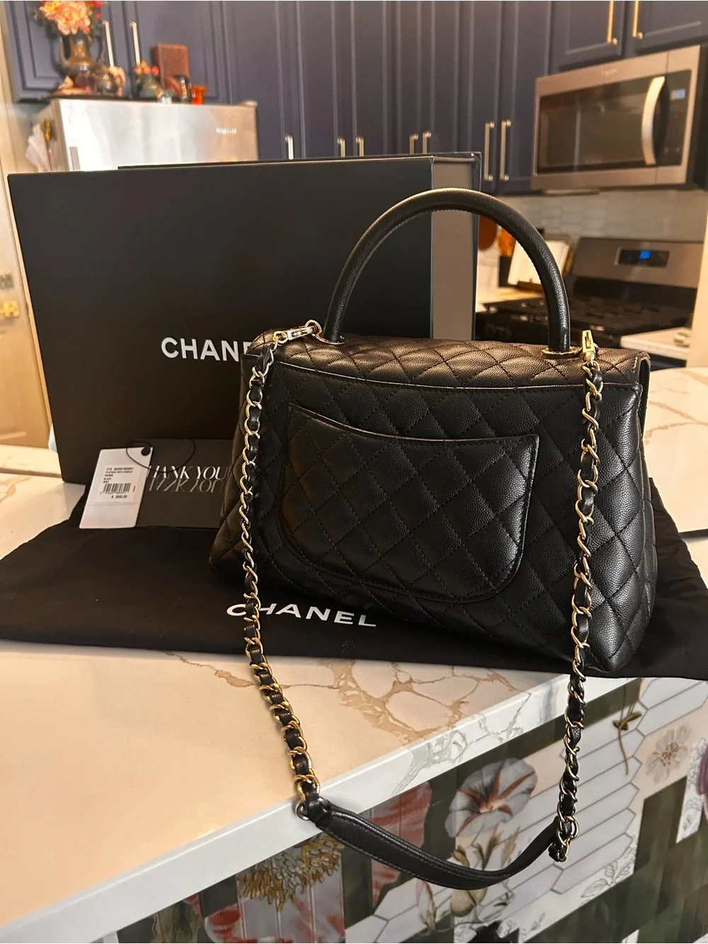 CHANEL Black Quilted Leather Satchel with Gold Chain